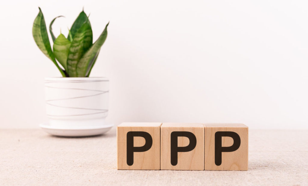 Three wooden blocks side by side with the letter P on each