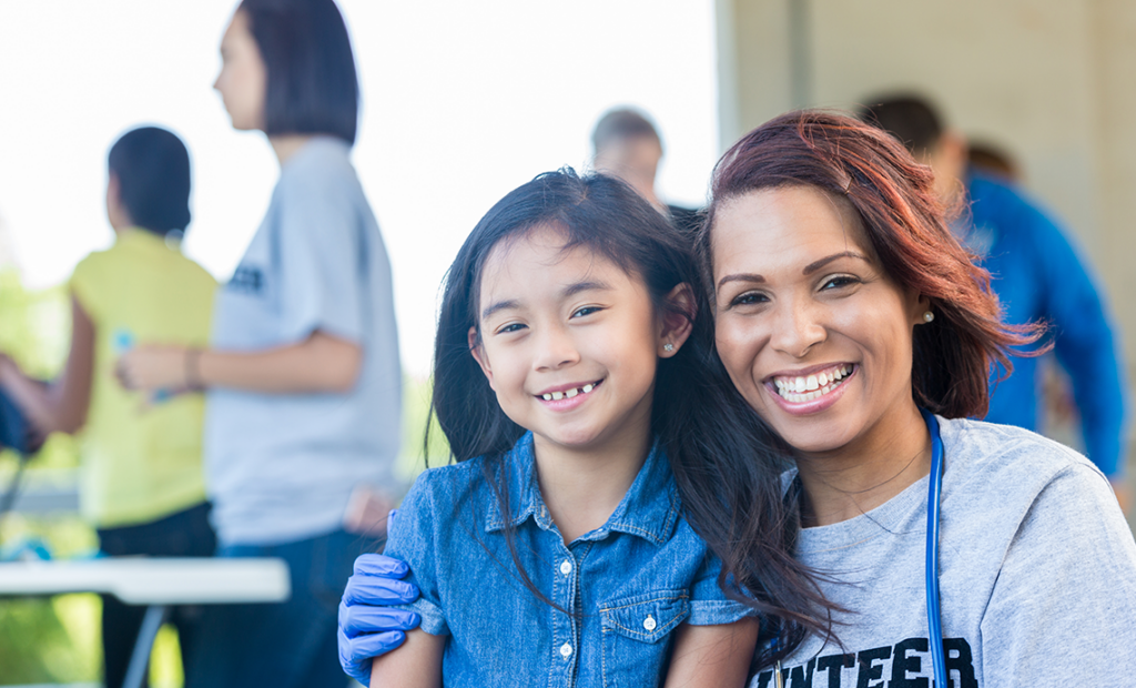 Volunteer and child at Boys & Girls Club